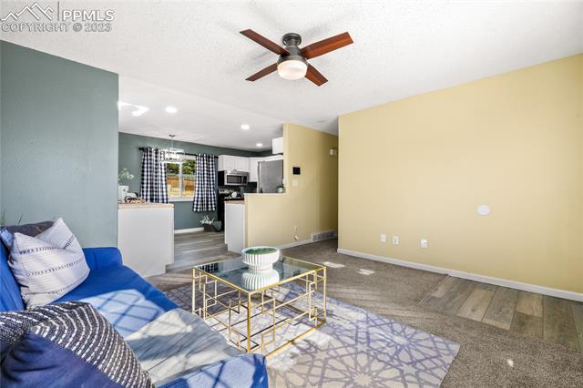 6786 Dale Road Colorado Springs, CO 80915 - Photo 7 of 23 View of the Eat-In Kitchen from the Living Room