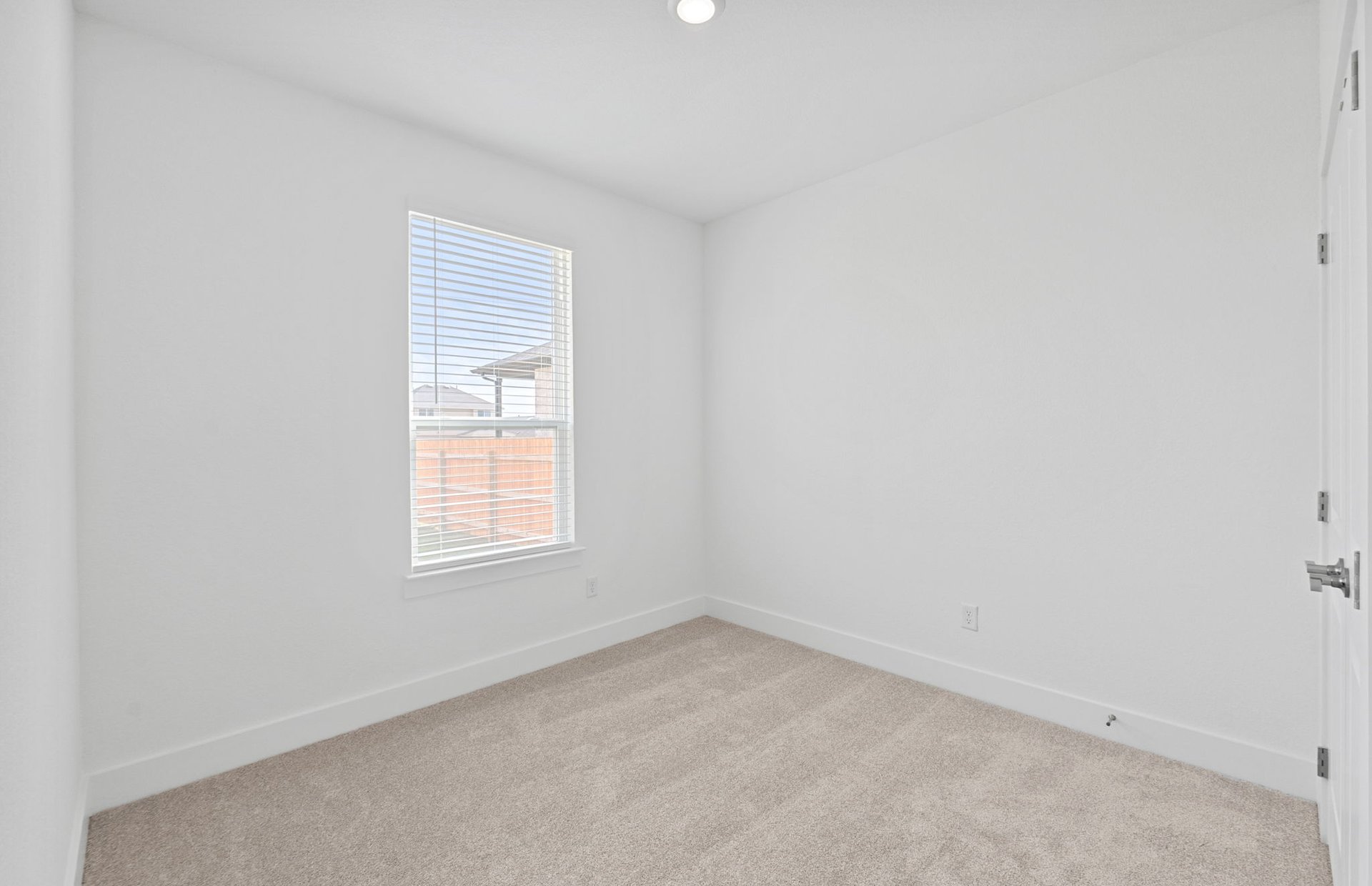 494 Tailwind Drive Kyle, TX 78640 - Photo 21 of 34 an empty room with a window