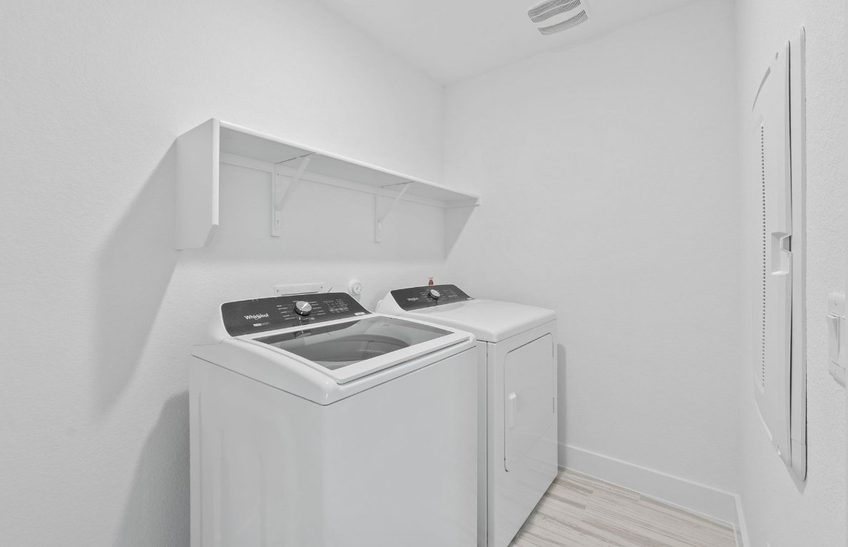 494 Tailwind Drive Kyle, TX 78640 - Photo 26 of 34 a utility room with dryer and washer