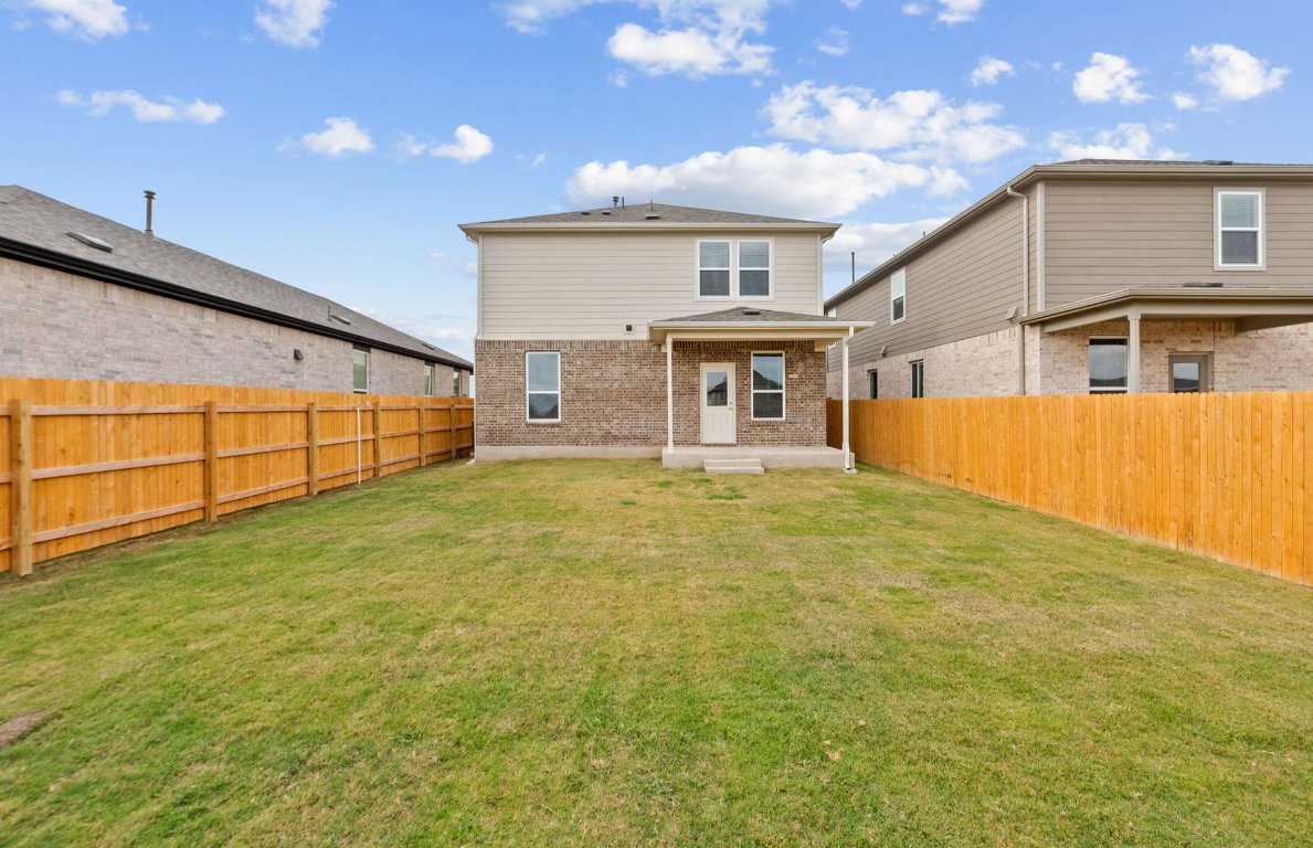 494 Tailwind Drive Kyle, TX 78640 - Photo 30 of 34 a view of a house with a swimming pool