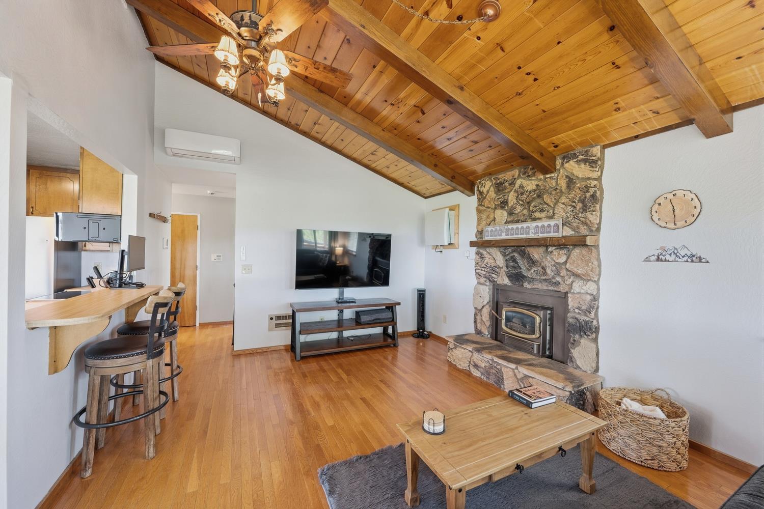 5595 Jasper-Ridge Murphys, CA 95247 - Photo 11 of 96 Bright, spacious living room with open-beam pine ceiling.