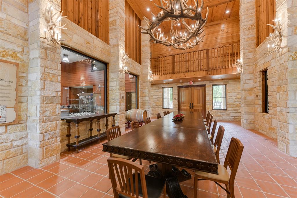 802 South Austin Street Comanche, TX 76442 - Photo 20 of 20 a view of a patio with table and chairs and potted plants
