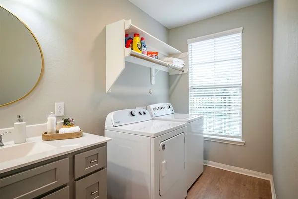 a utility room with dryer and washer