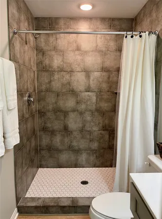 a bathroom with a sink and a toilet