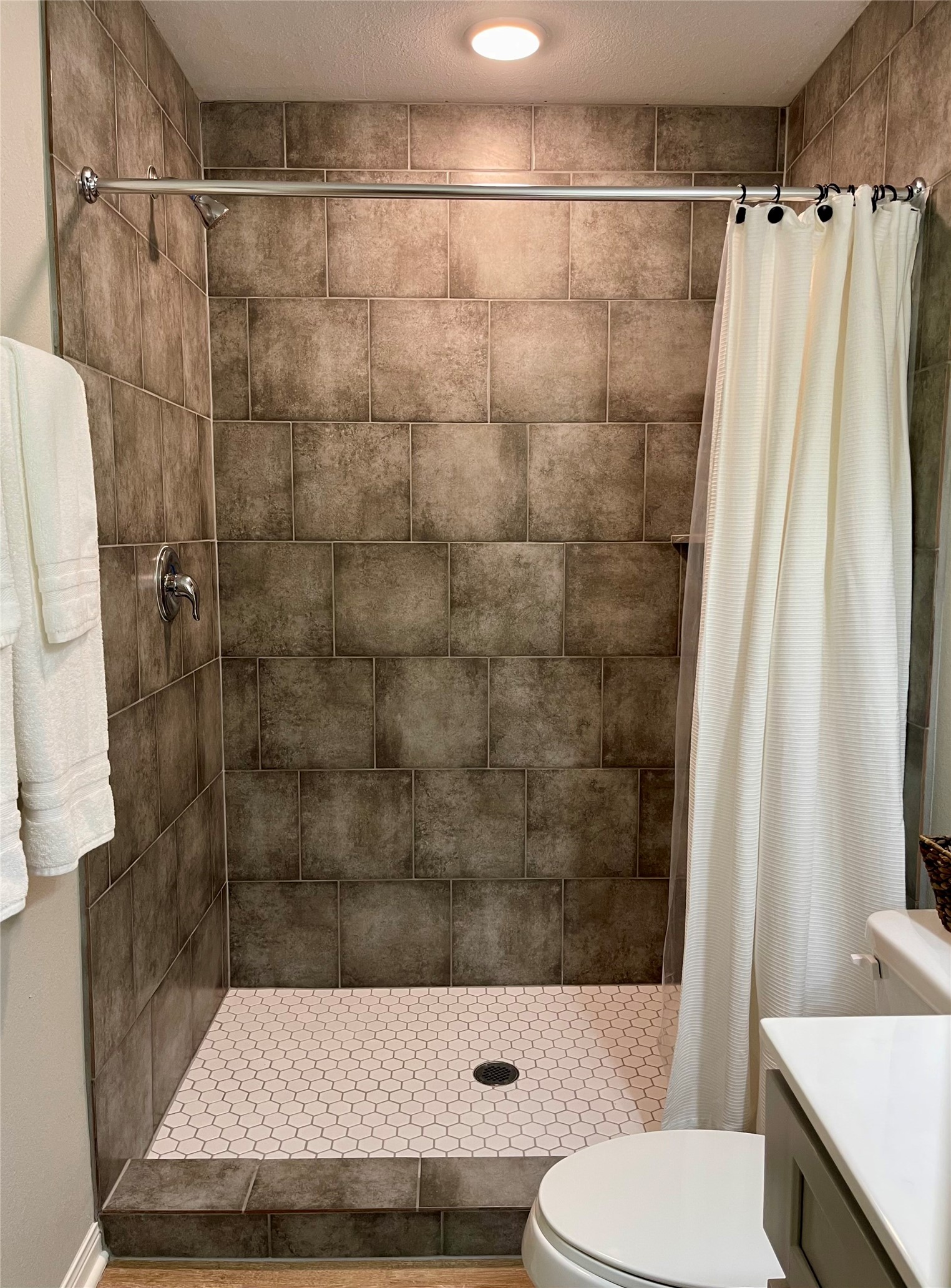 1714 Mary Street, Unit A Houston, TX 77026 - Photo 16 of 19 a bathroom with a sink and a toilet