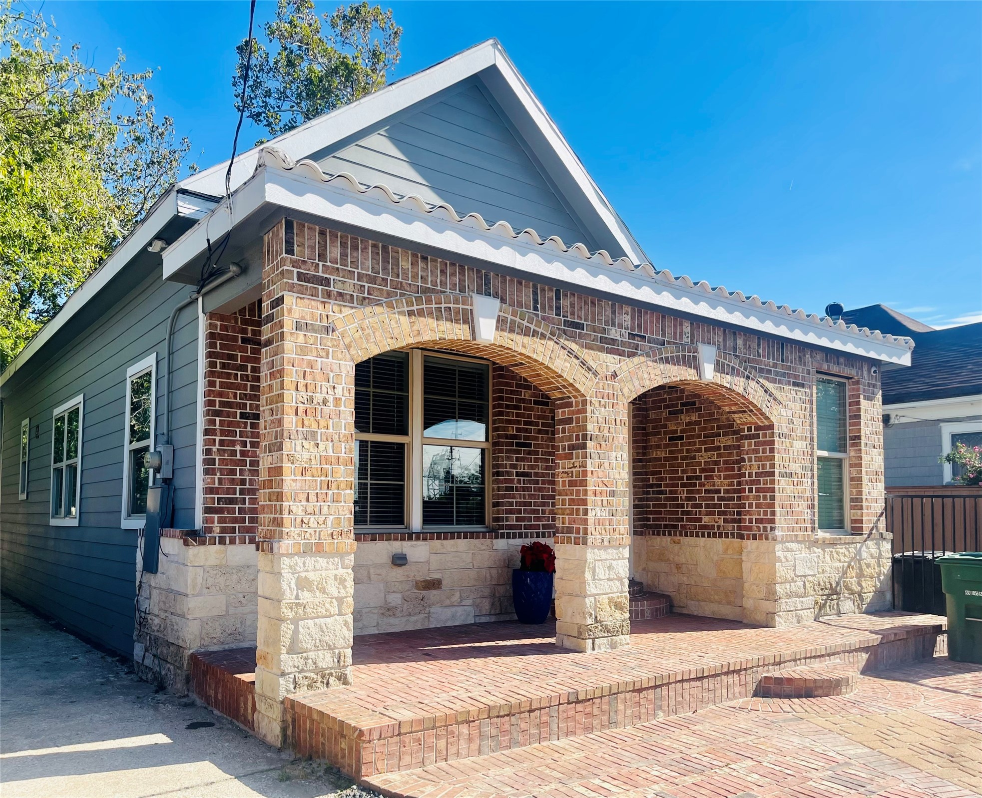 1714 Mary Street, Unit A Houston, TX 77026 - Photo 2 of 19 a front view of a house with a porch