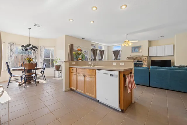 a view of kitchen with furniture and a window