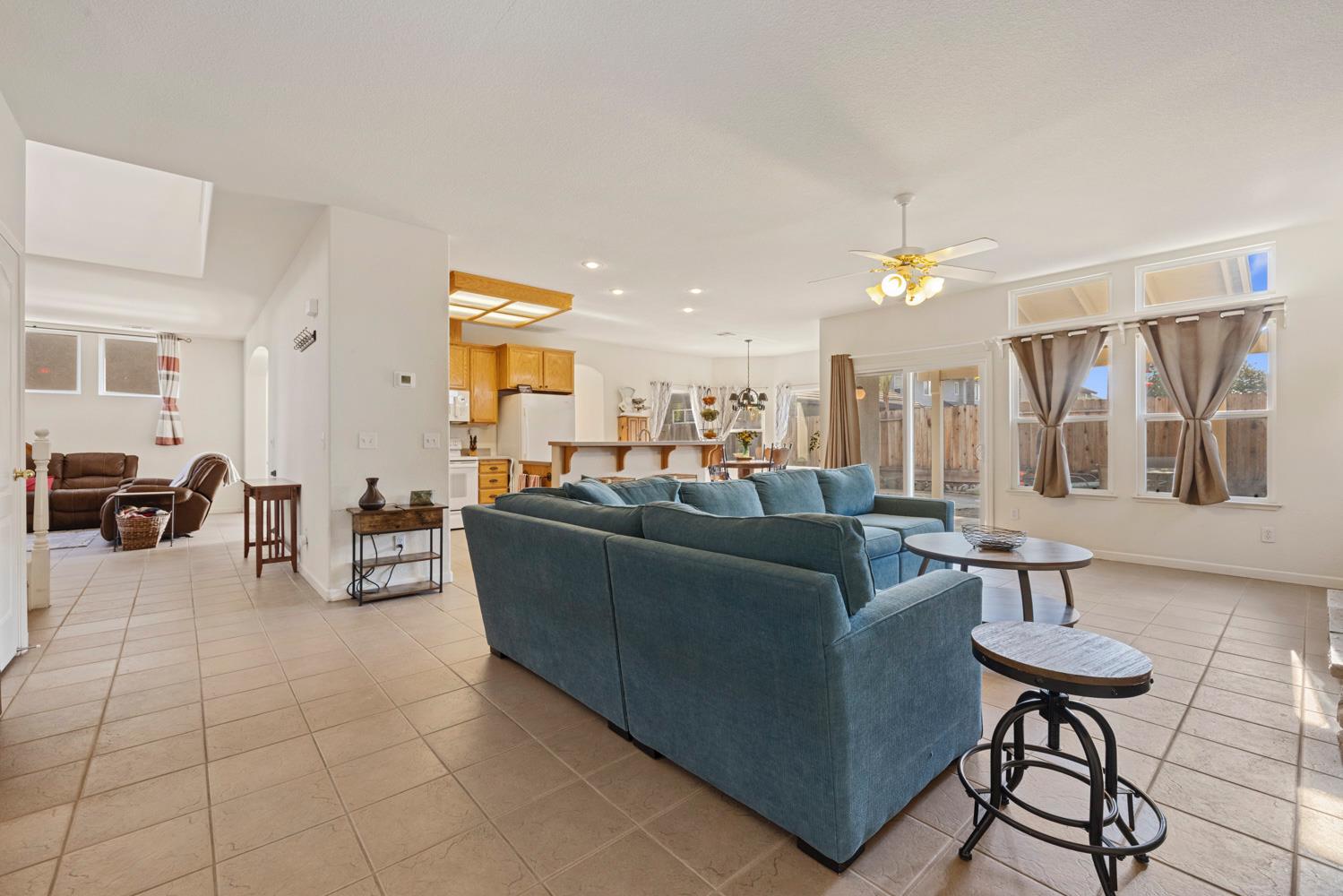 2730 Explorer Way Turlock, CA 95382 - Photo 24 of 64 a living room with furniture and a table