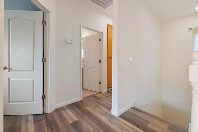 a view of a backyard with sitting area