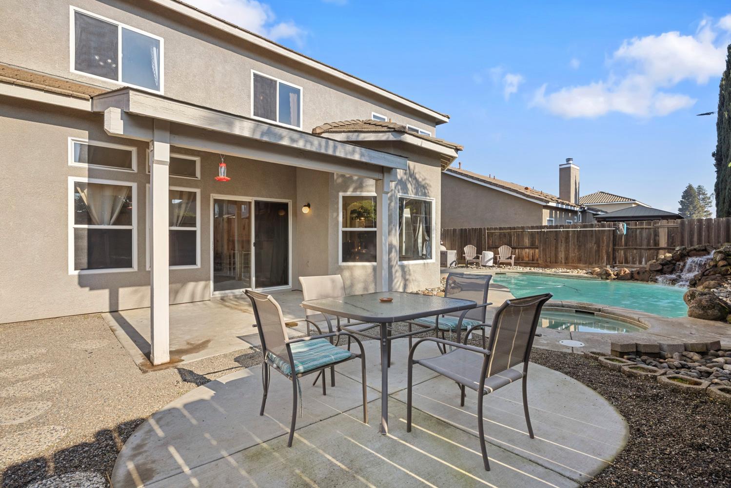 2730 Explorer Way Turlock, CA 95382 - Photo 53 of 64 a view of a house with backyard and sitting area