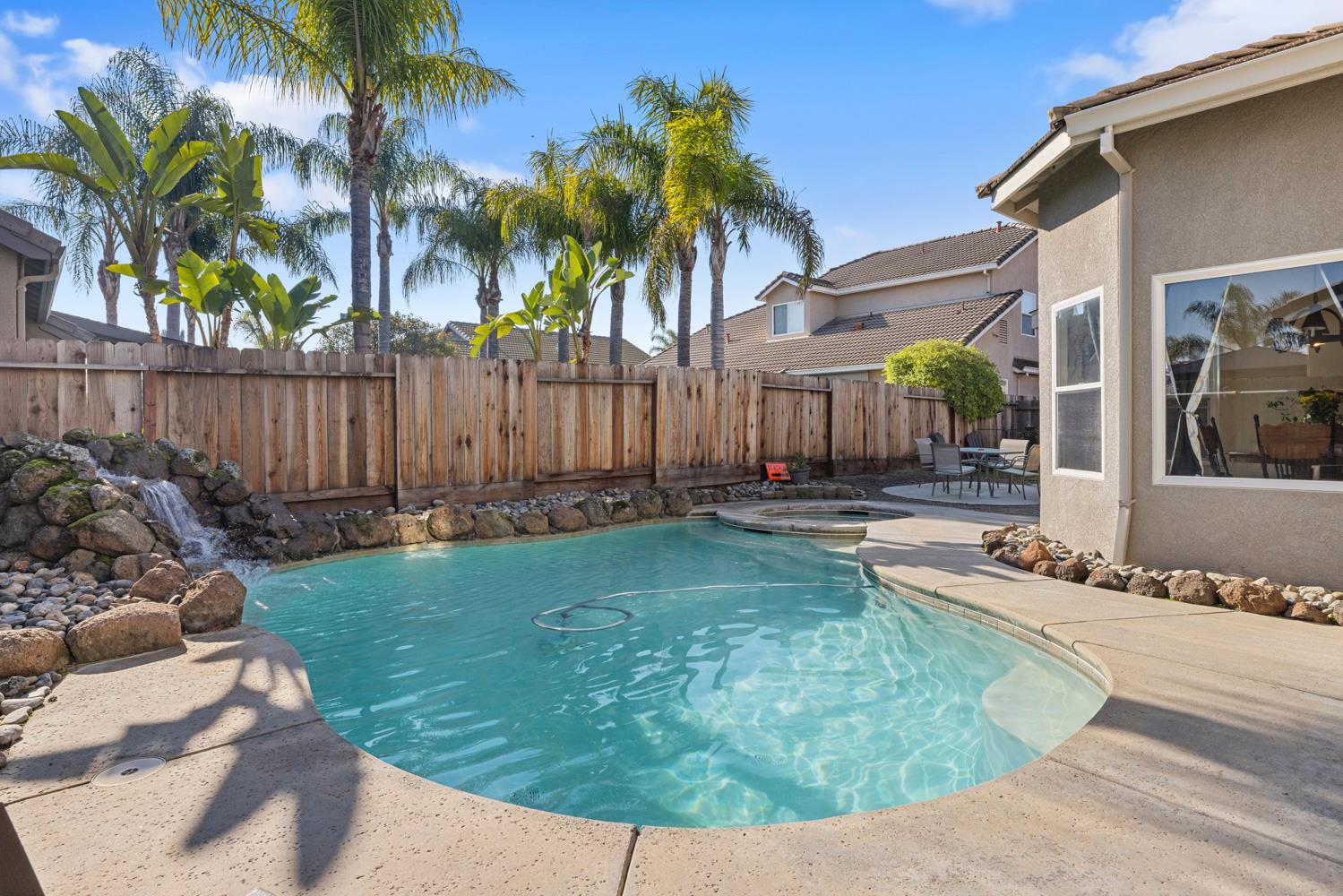 2730 Explorer Way Turlock, CA 95382 - Photo 55 of 64 a view of a backyard with a patio