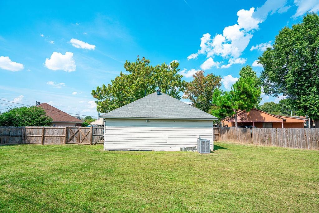 5340 Shady Ridge Cove Memphis, TN 38141 - Photo 22 of 22 Fenced backyard with a gate