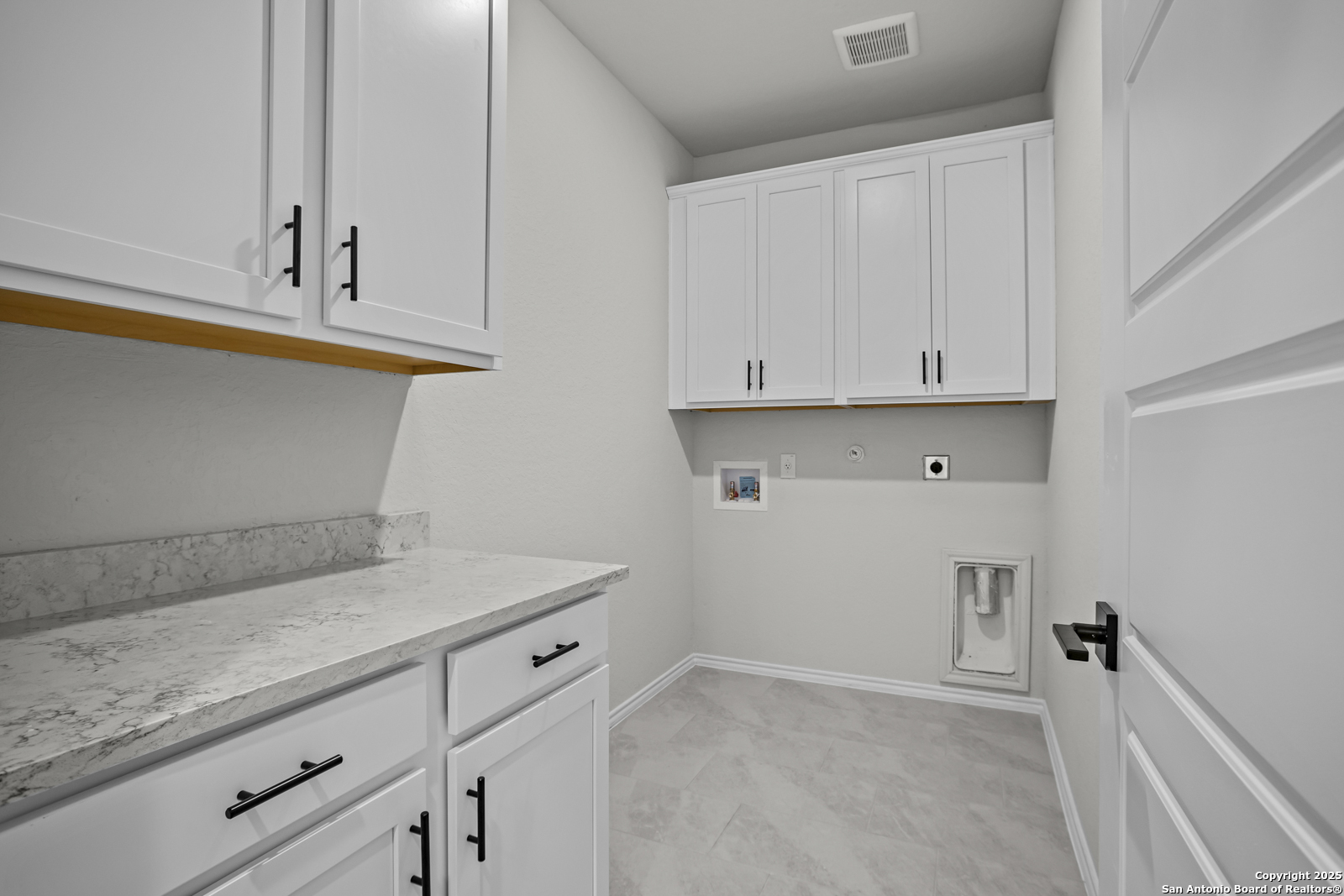 7420 Cremorne Converse, TX 78109 - Photo 31 of 40 a view of cabinets and wooden floor