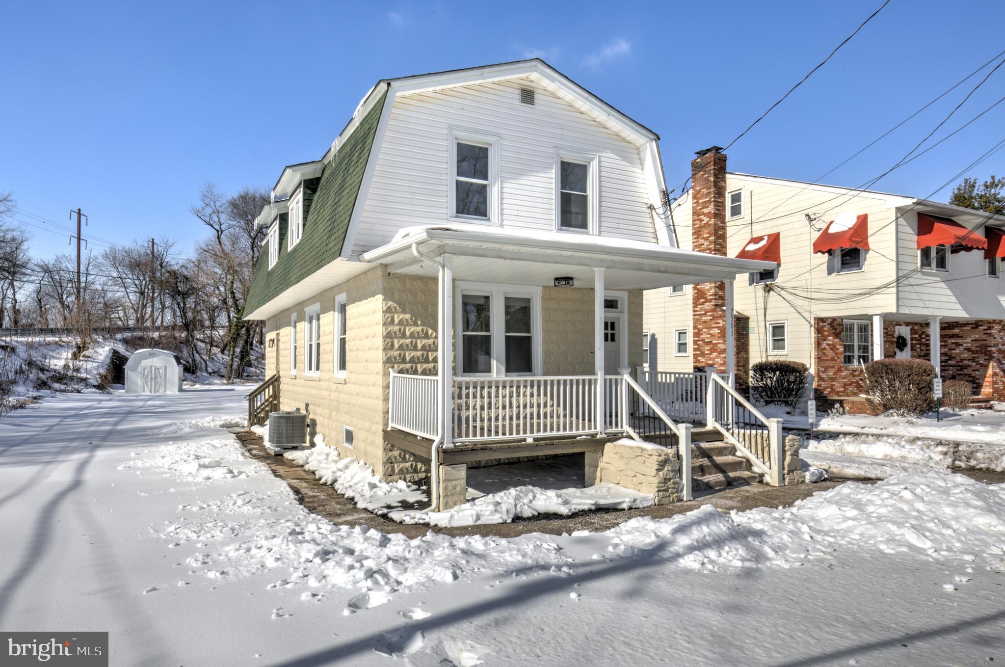 7301 North Radcliffe Street Bristol, PA 19007 - Photo 35 of 43 a view of a white house with a large windows
