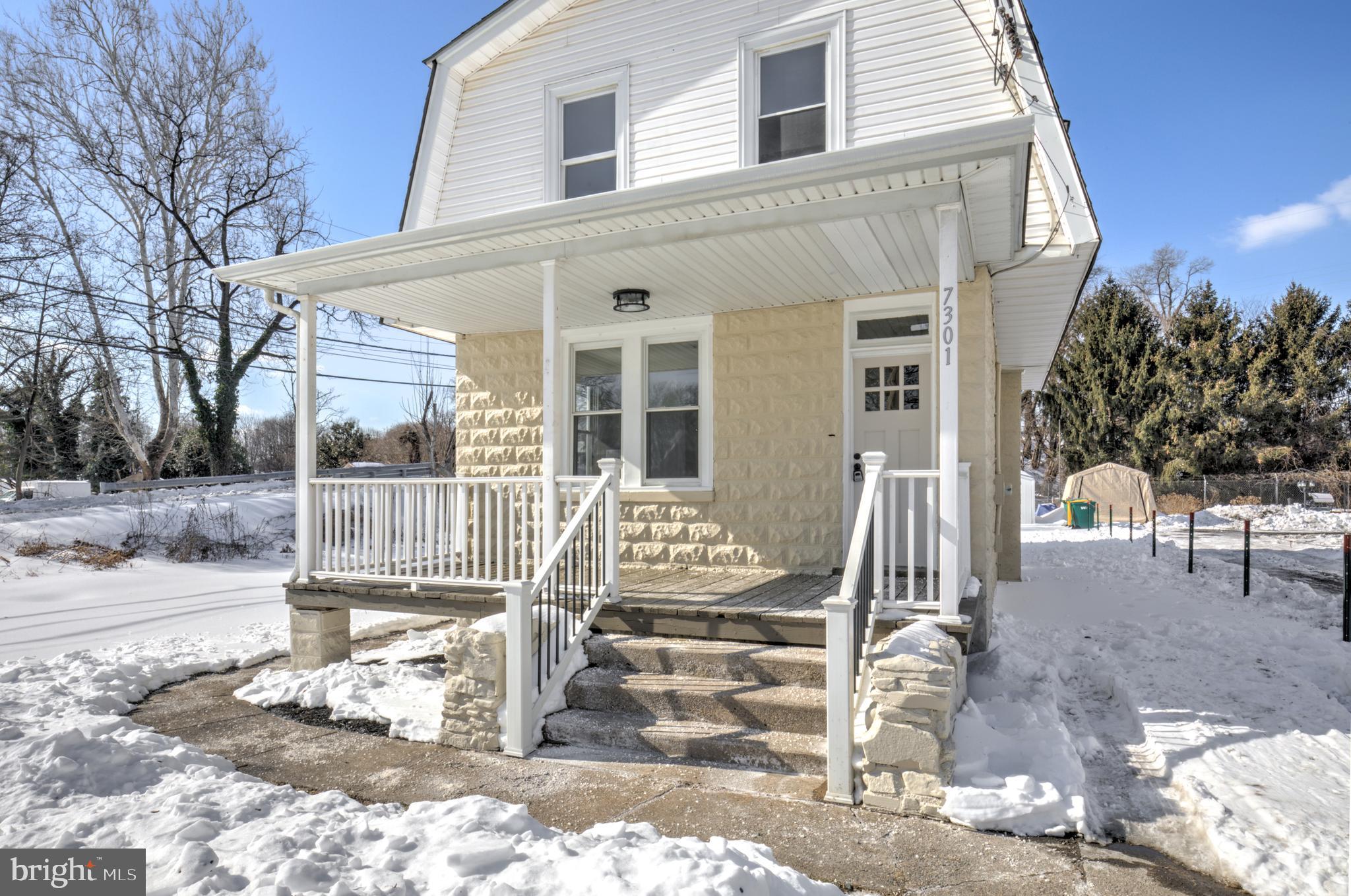 7301 North Radcliffe Street Bristol, PA 19007 - Photo 36 of 43 a front view of a house with a tree