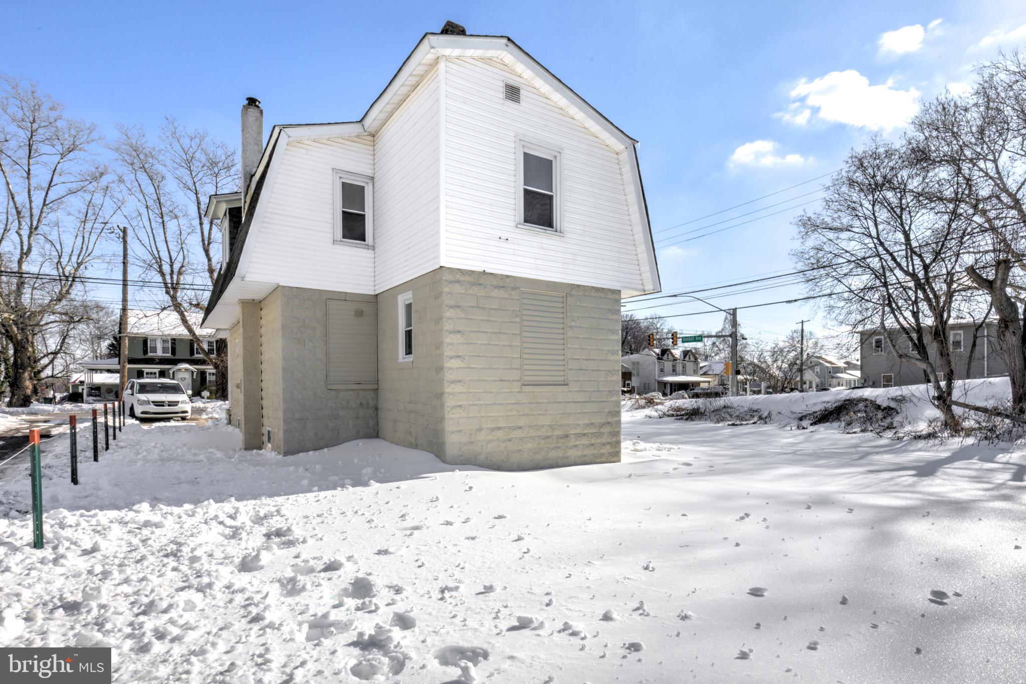 7301 North Radcliffe Street Bristol, PA 19007 - Photo 40 of 43 a view of a house with a snow in the yard
