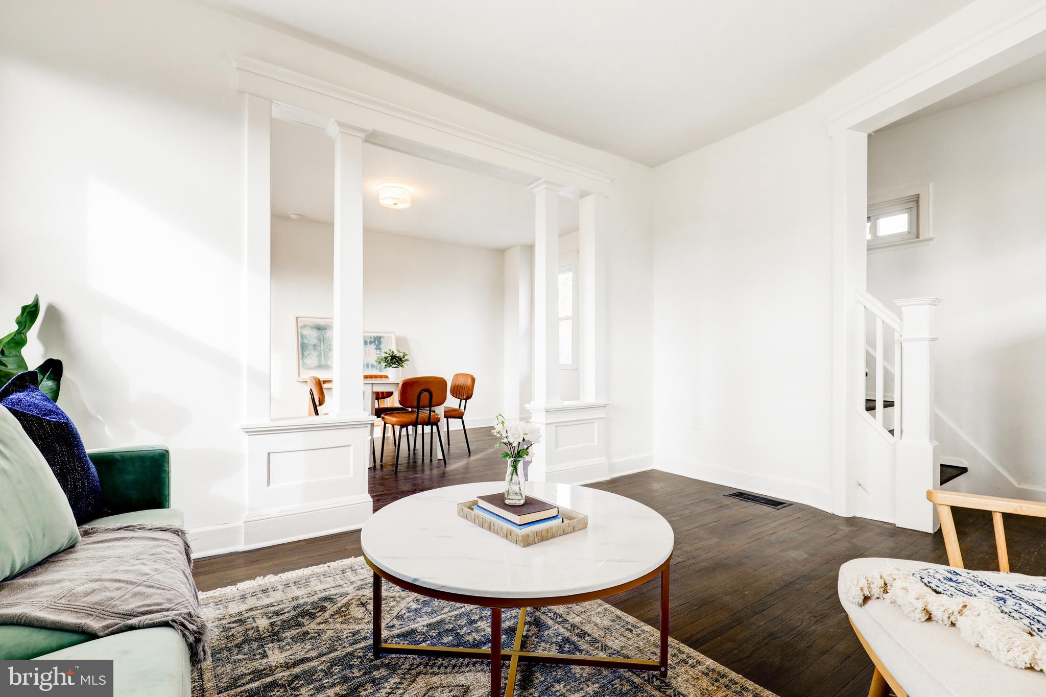 7301 North Radcliffe Street Bristol, PA 19007 - Photo 6 of 43 a living room with furniture and a wooden floor
