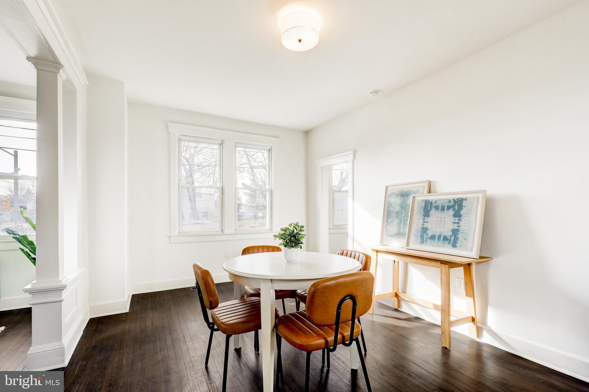 7301 North Radcliffe Street Bristol, PA 19007 - Photo 8 of 43 a dining room with furniture and wooden floor