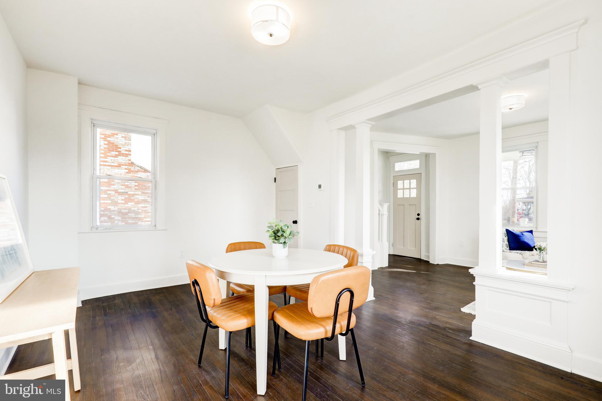 7301 North Radcliffe Street Bristol, PA 19007 - Photo 9 of 43 a view of a dining room with furniture and wooden floor