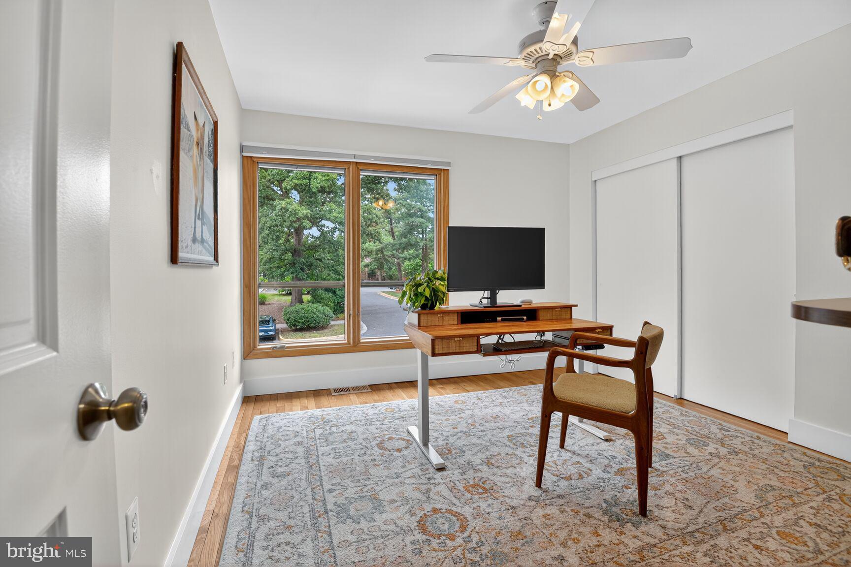 11775 Indian Ridge Road Reston, VA 20191 - Photo 18 of 29 a view of a workspace with furniture and a window