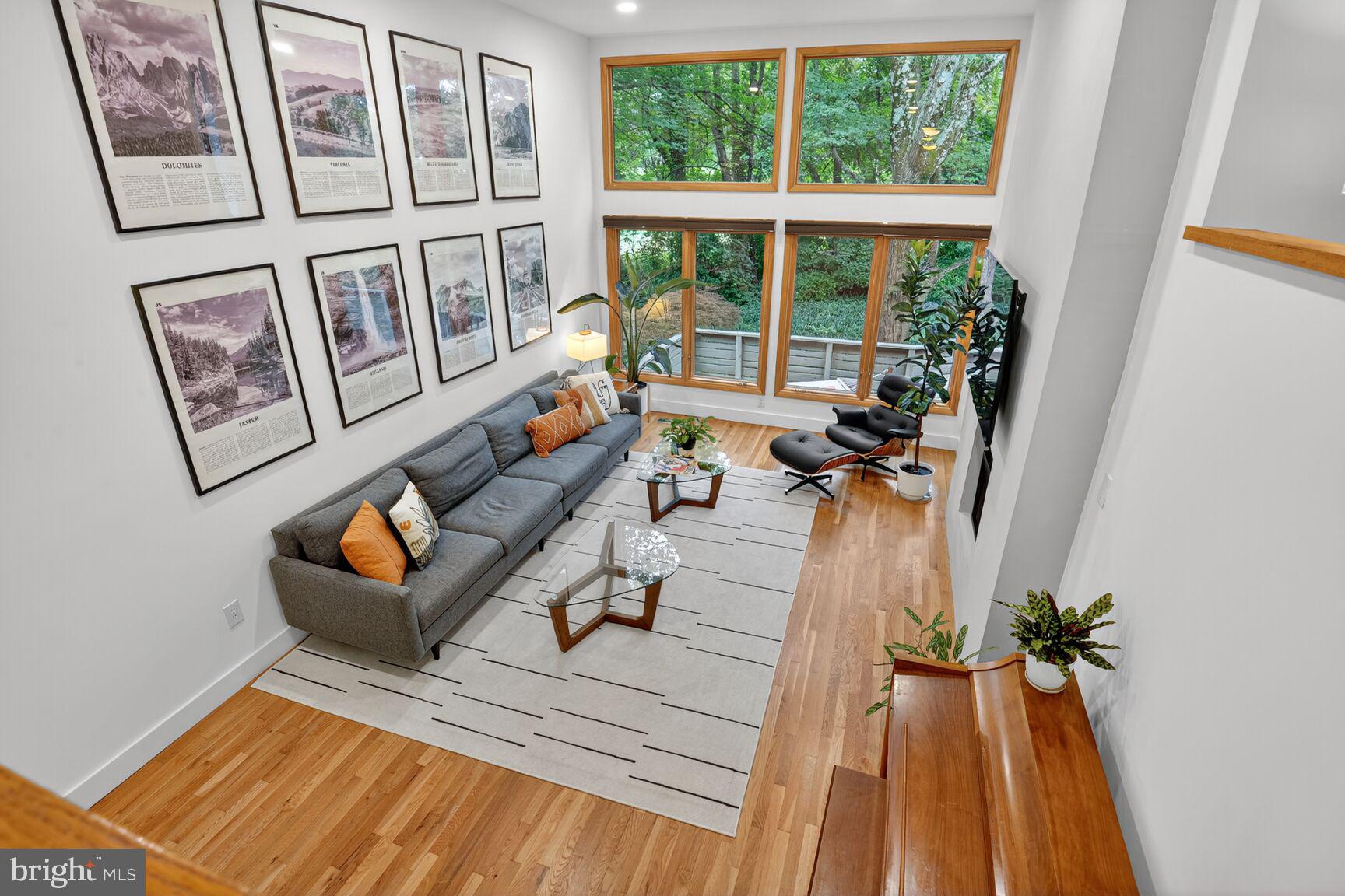 11775 Indian Ridge Road Reston, VA 20191 - Photo 3 of 29 a living room with furniture and a large window