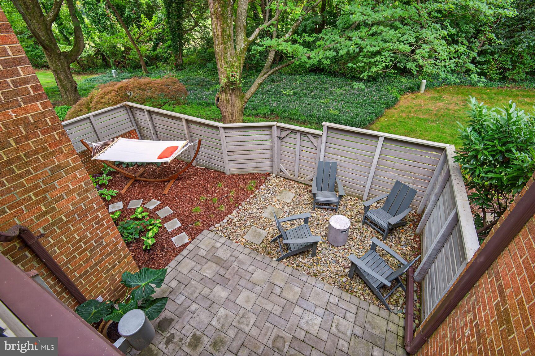 11775 Indian Ridge Road Reston, VA 20191 - Photo 9 of 29 a view of a backyard with sitting area