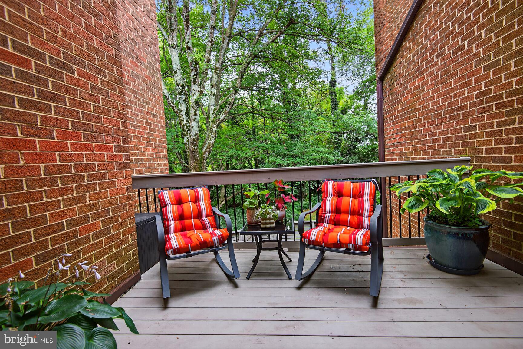 11775 Indian Ridge Road Reston, VA 20191 - Photo 10 of 29 a bench sitting in front of a building