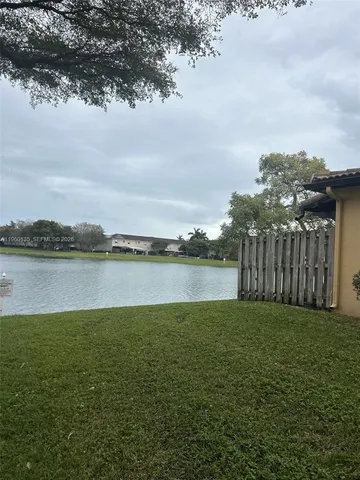 a view of a lake from a yard