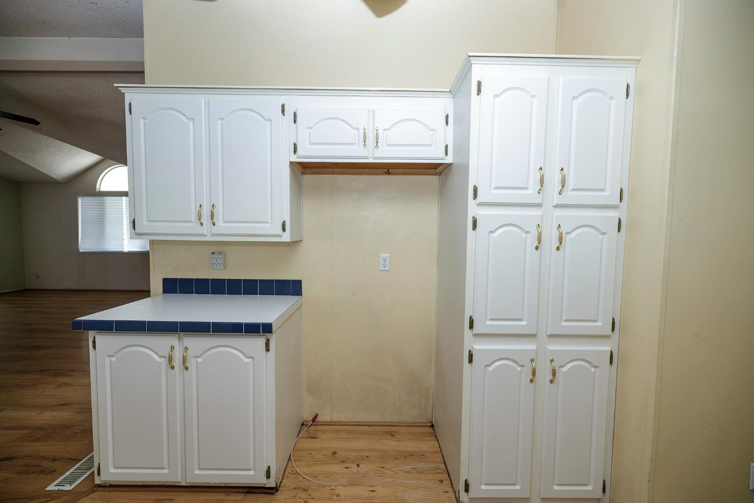 2621 Prescott Road, Unit 160 Modesto, CA 95350 - Photo 17 of 37 a view of cabinets and wooden floor