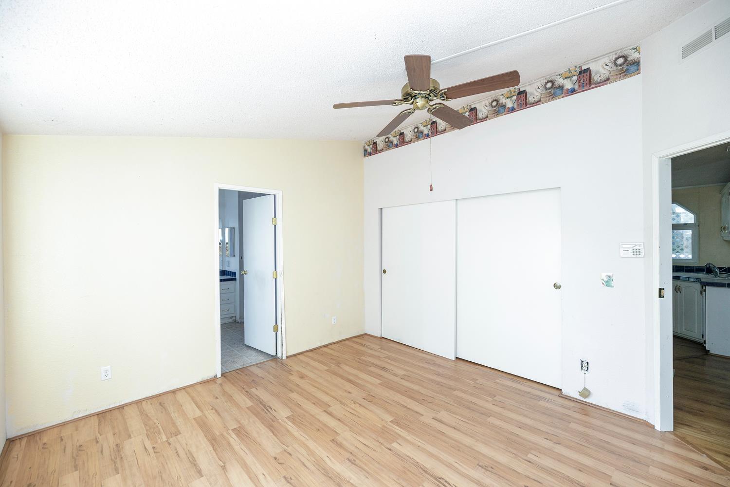2621 Prescott Road, Unit 160 Modesto, CA 95350 - Photo 22 of 37 a view of a room with a wooden floor