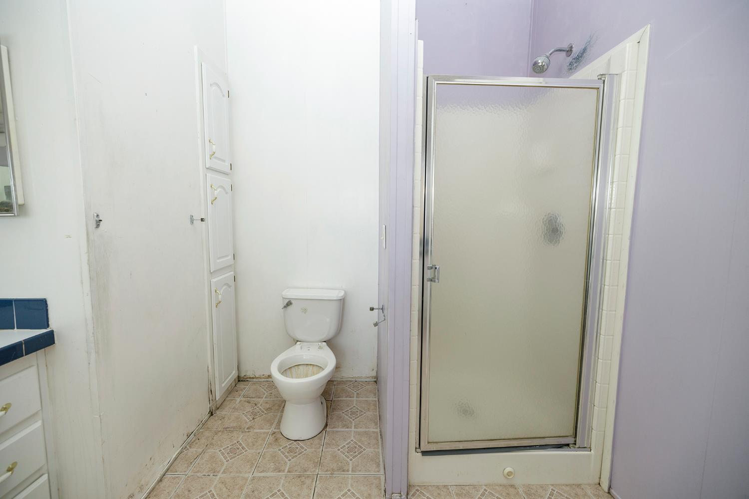 2621 Prescott Road, Unit 160 Modesto, CA 95350 - Photo 26 of 37 a bathroom with a granite countertop toilet and a sink
