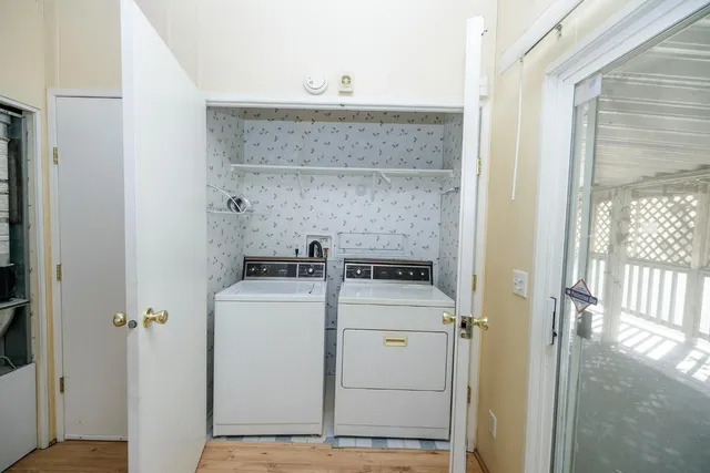 a utility room with dryer and washer