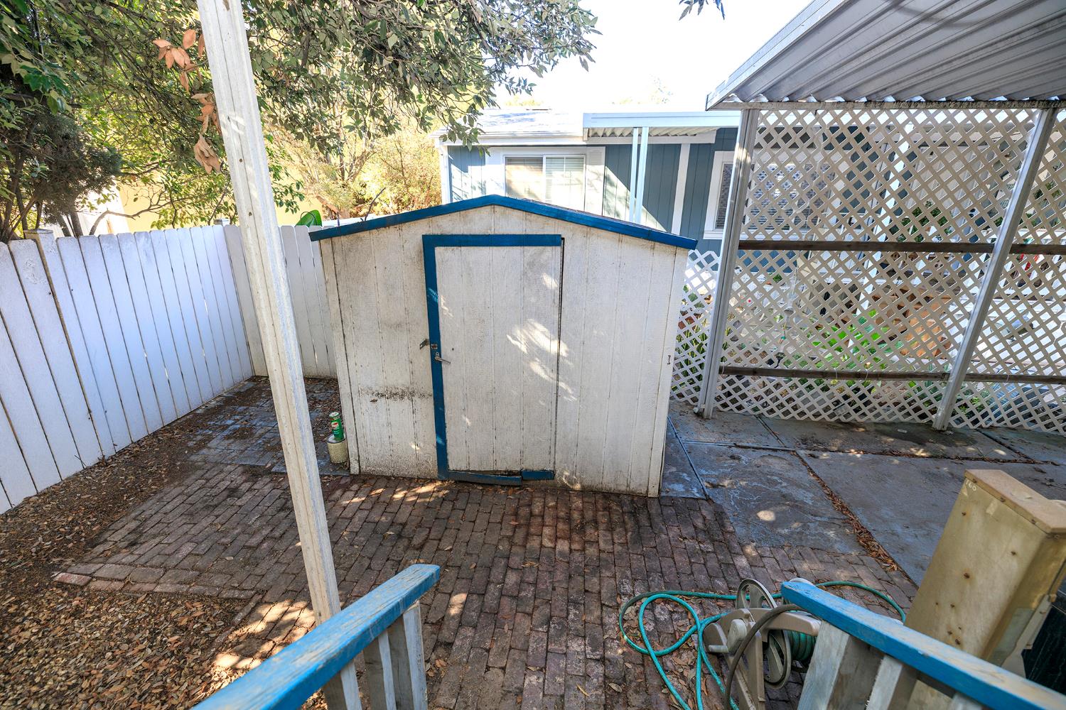 2621 Prescott Road, Unit 160 Modesto, CA 95350 - Photo 32 of 37 a view of a house with a wooden deck