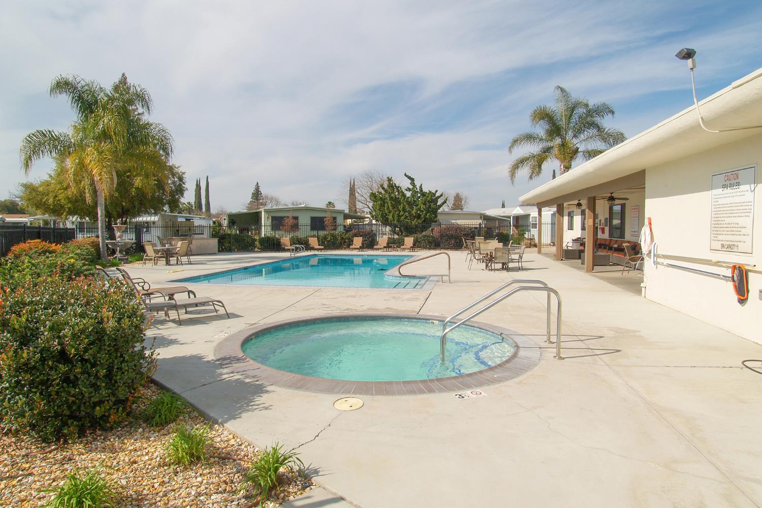 2621 Prescott Road, Unit 160 Modesto, CA 95350 - Photo 36 of 37 a view of a swimming pool with a patio
