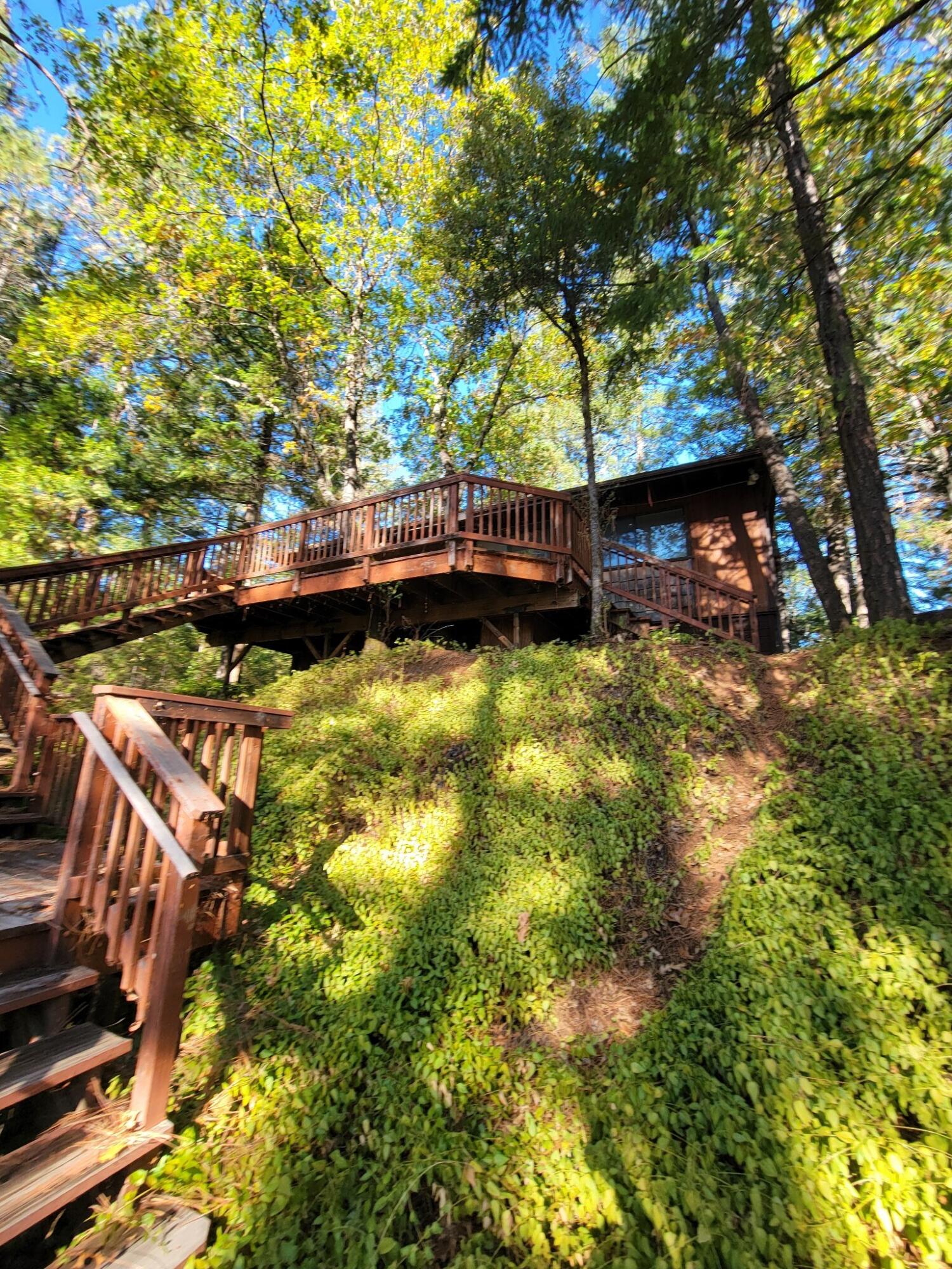 330 Lake Road Junction City, CA 96048 - Photo 1 of 50 a view of a swimming pool with a patio