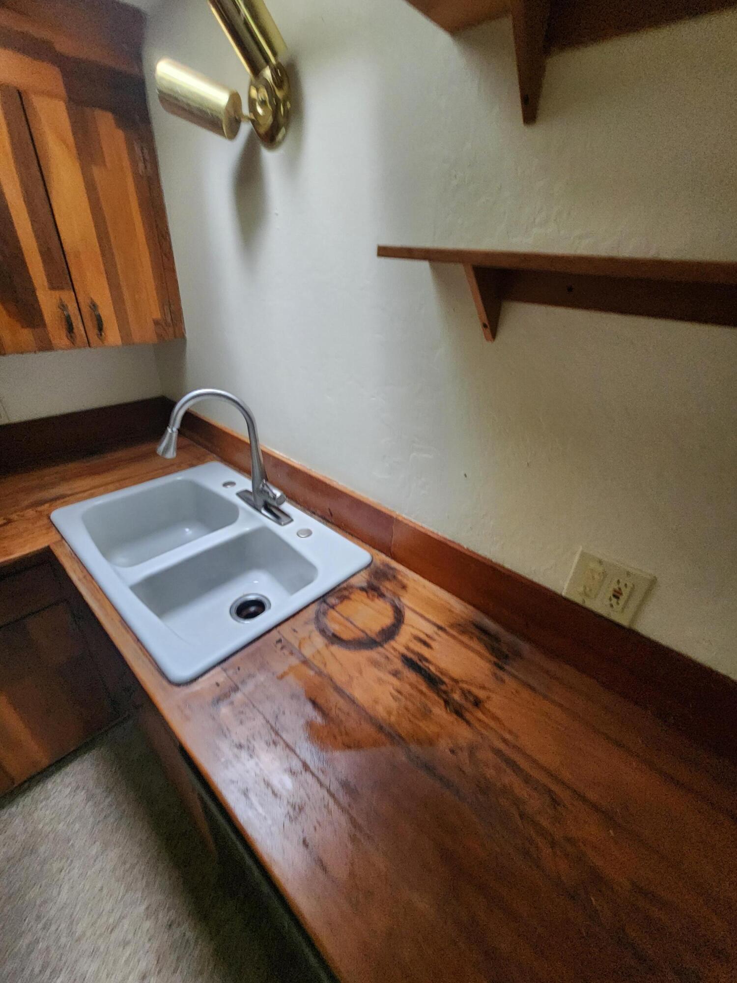 330 Lake Road Junction City, CA 96048 - Photo 11 of 50 a bathroom with a sink and a mirror