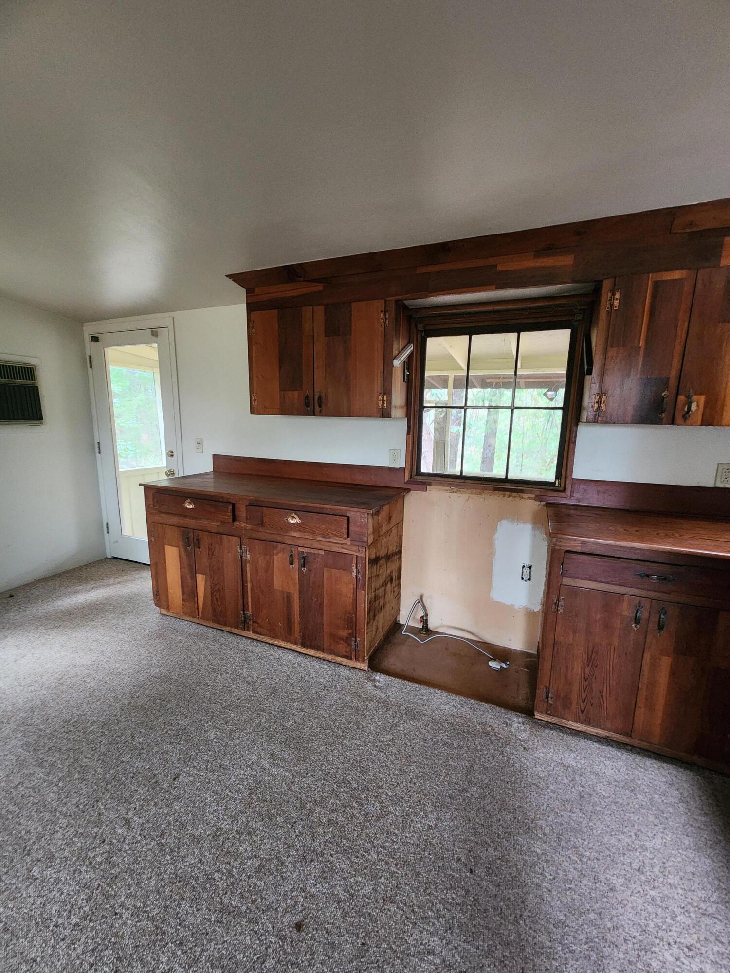 330 Lake Road Junction City, CA 96048 - Photo 12 of 50 a room with a cabinets and a sink