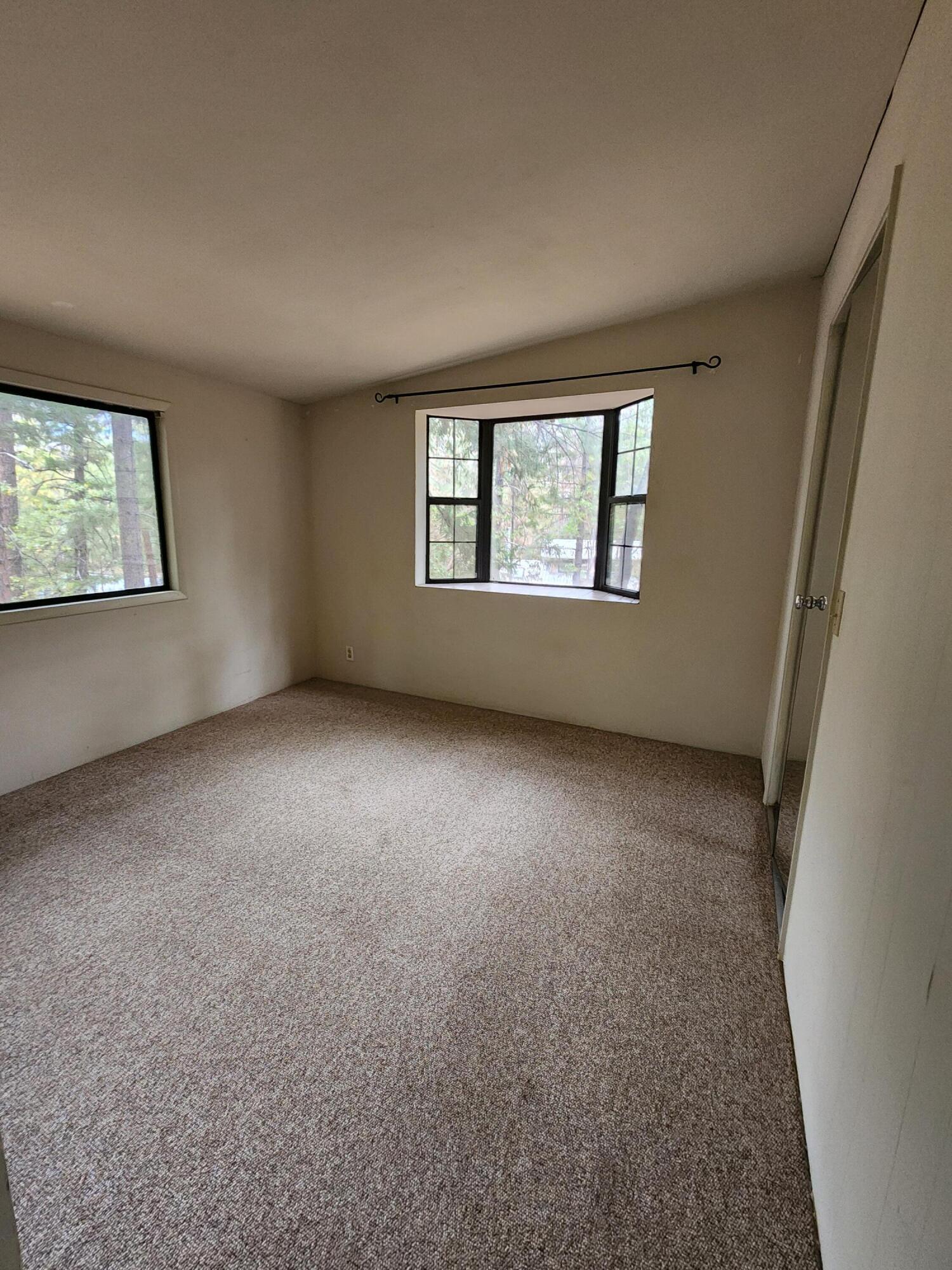 330 Lake Road Junction City, CA 96048 - Photo 18 of 50 an empty room with windows