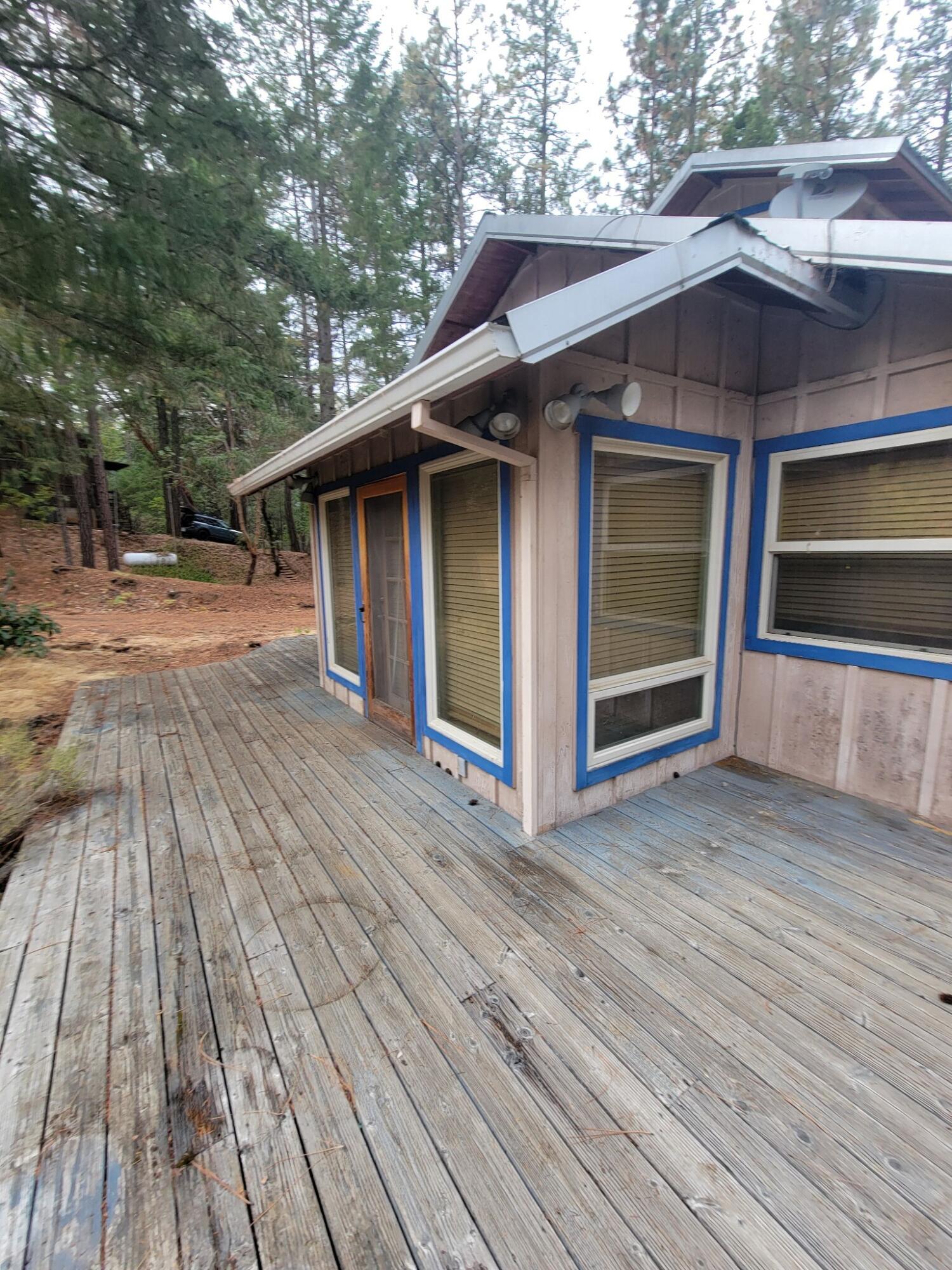330 Lake Road Junction City, CA 96048 - Photo 31 of 50 a house with wooden floor in front of it