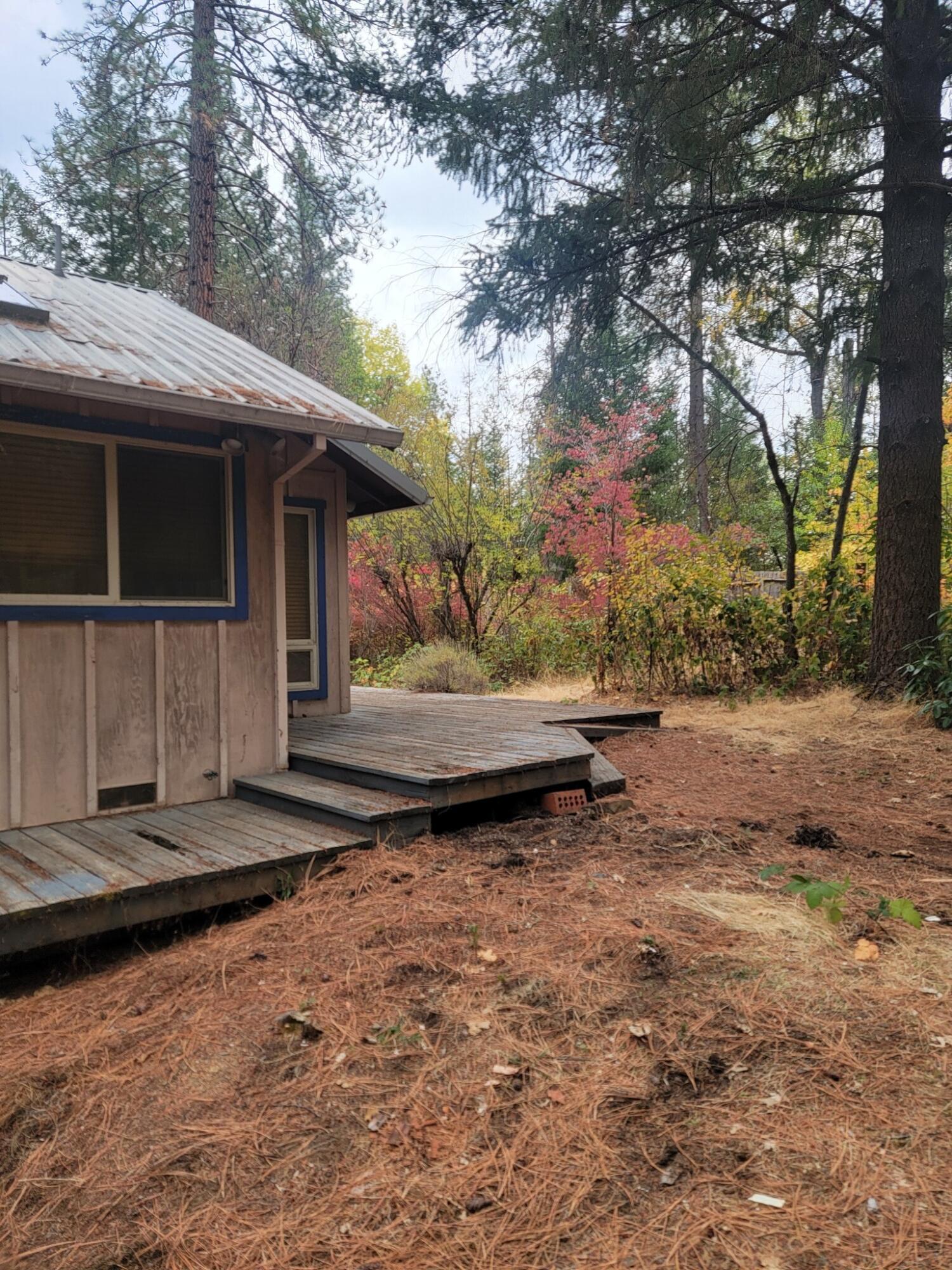 330 Lake Road Junction City, CA 96048 - Photo 33 of 50 a view of a barn in the middle of a yard