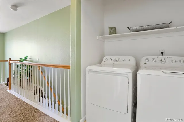 a view of a hallway view with staircase