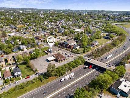 an aerial view of city and trees