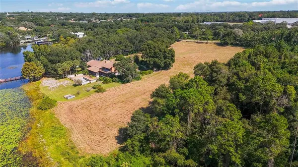 a view of a lake with a houses