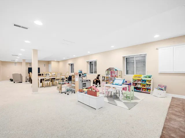 a bed room with furniture and a window