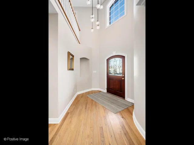 a view of a living room with a fireplace