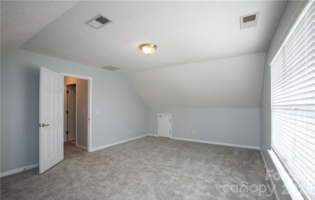 815 Knightsbridge Road Fort Mill, SC 29708 - Photo 27 of 30 an empty room with windows