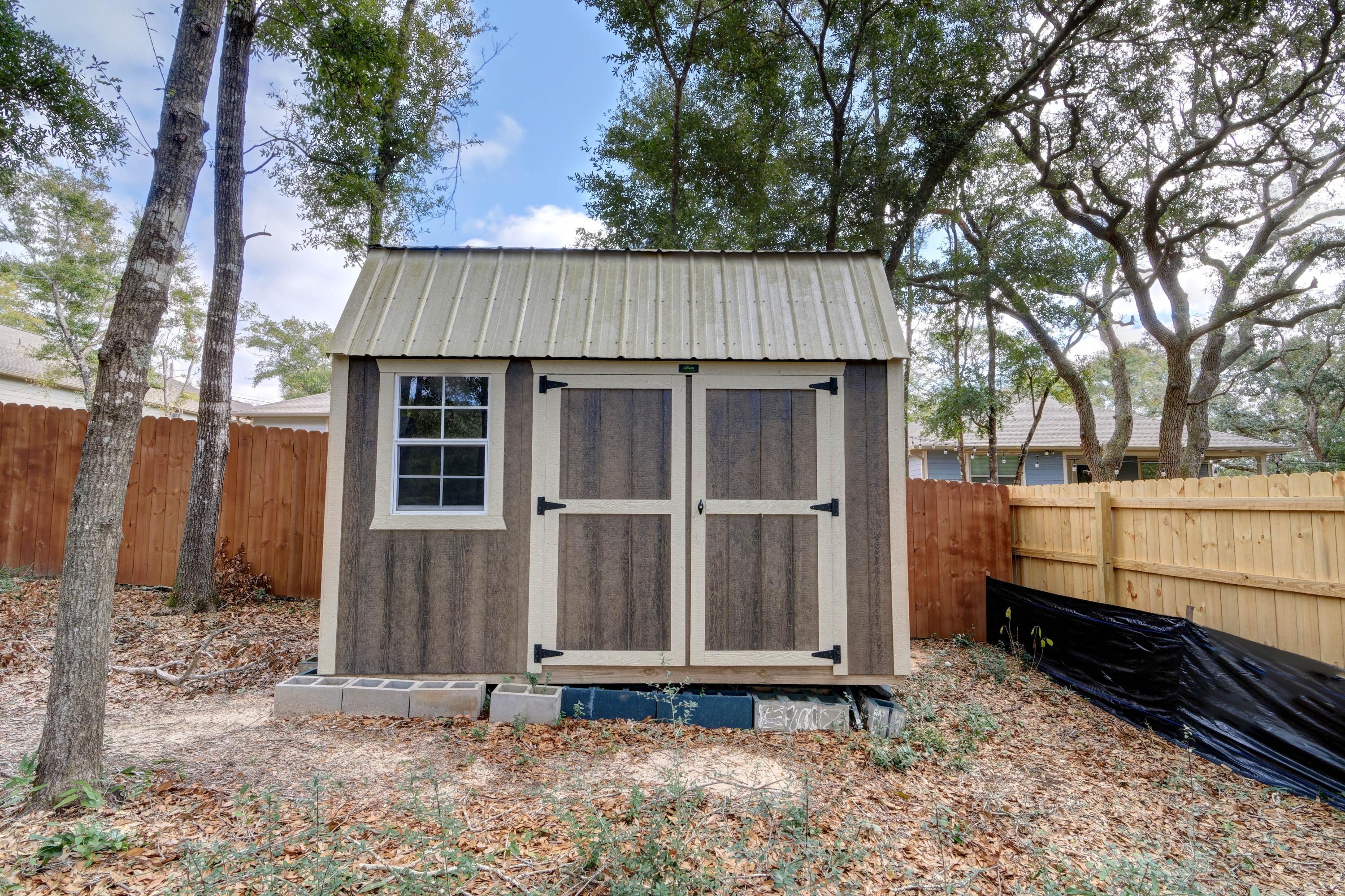 3083 5 Forks Road Navarre, FL 32566 - Photo 47 of 57 a view of a house with a yard