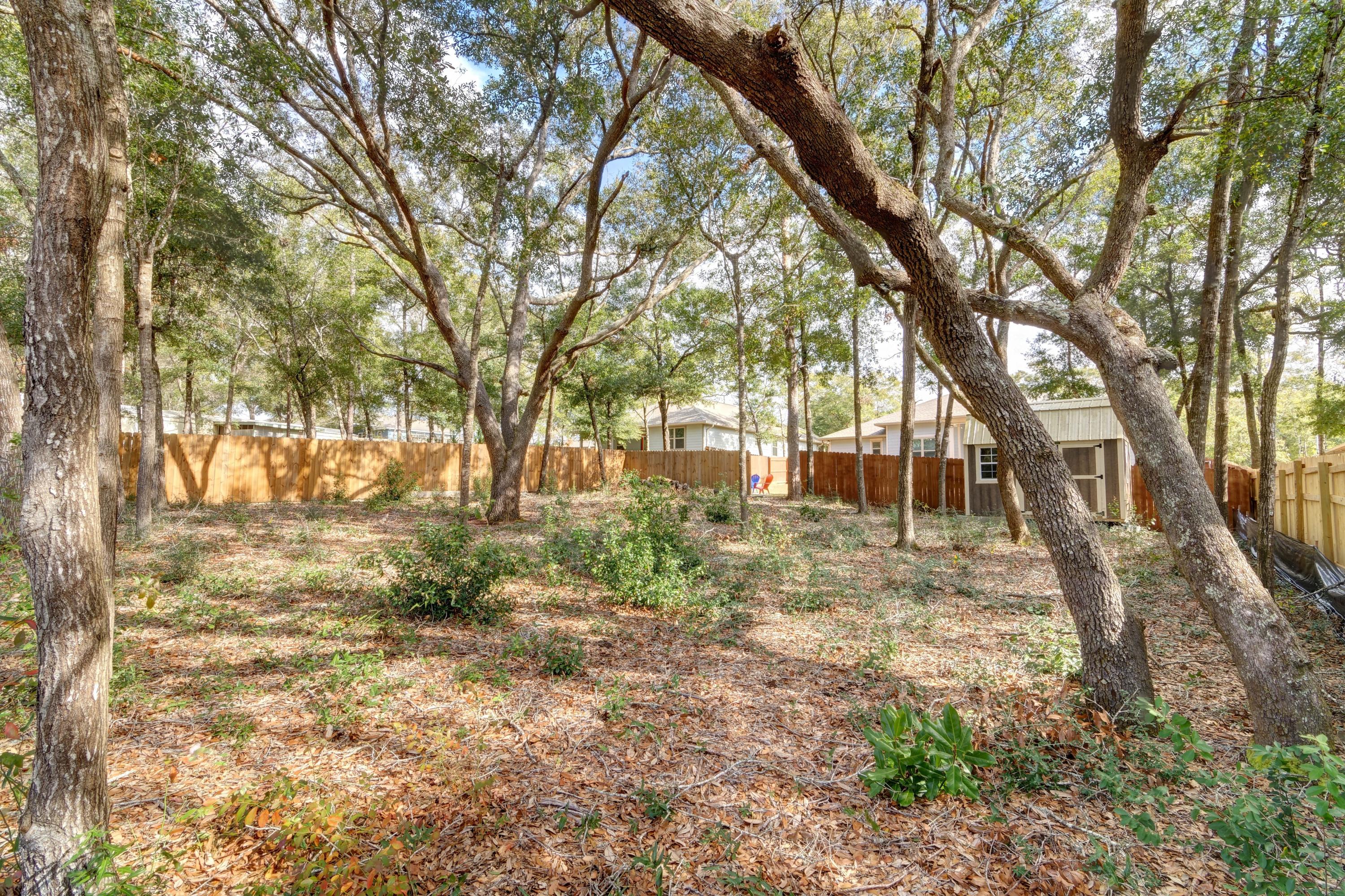 3083 5 Forks Road Navarre, FL 32566 - Photo 53 of 57 a view of yard covered with trees