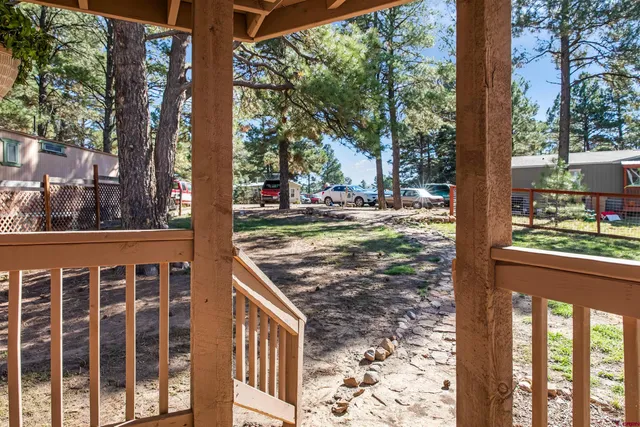 a view of a porch with a yard