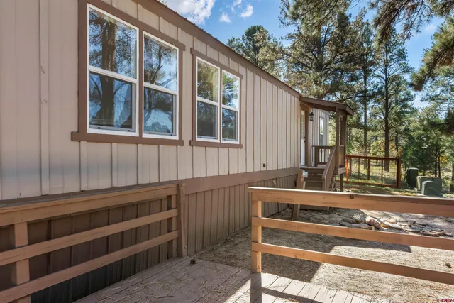 a view of a house with a large window